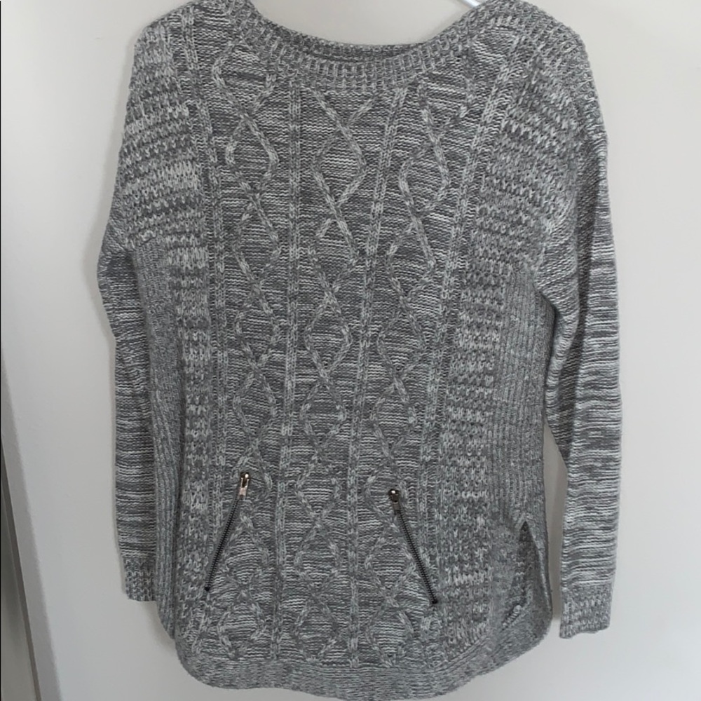 grey sweater with zipper pockets